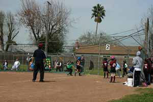 Marah stealing home!  Slide Marah!